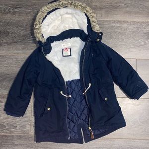 Navy blue winter coat.